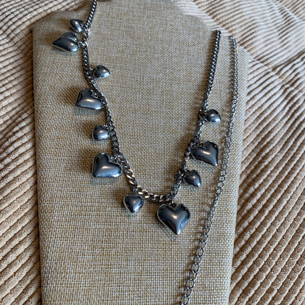 Juicy heart belly chain. Silver tone. Great condition.